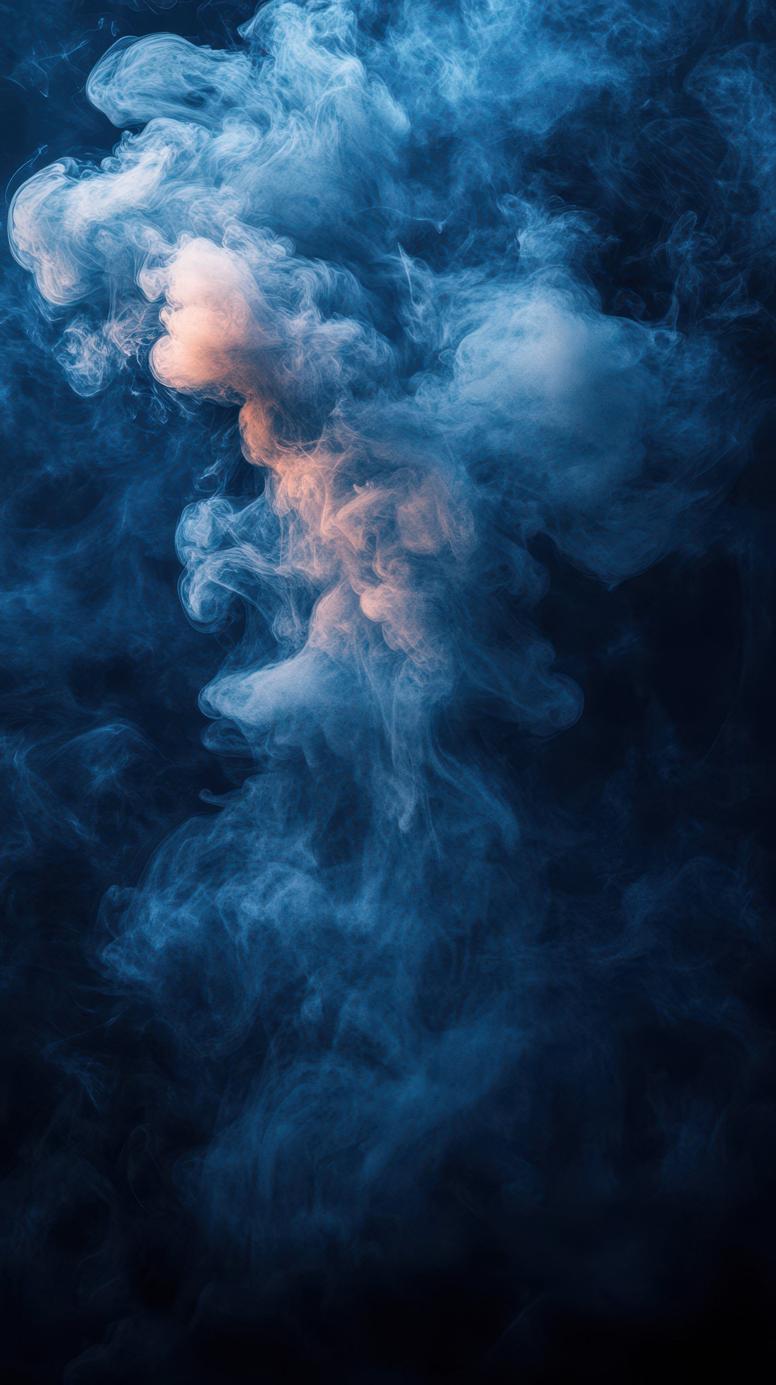 Colorful smoke swirling in dark background creates an atmospheric and artistic effect at night